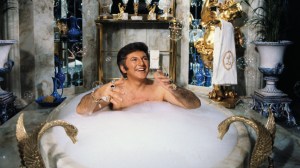 28 Jan 1978, Los Angeles, California, USA --- Liberace spoofs a day in his own life during a television special, including a scene where he baths in his $55,000 marble bathtub. --- Image by © Bettmann/CORBIS
