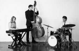 The AM Trio with Alysssa Murray on voice & piano, Joel Stratton on bass, and Josh Blythe on drums & vocals.